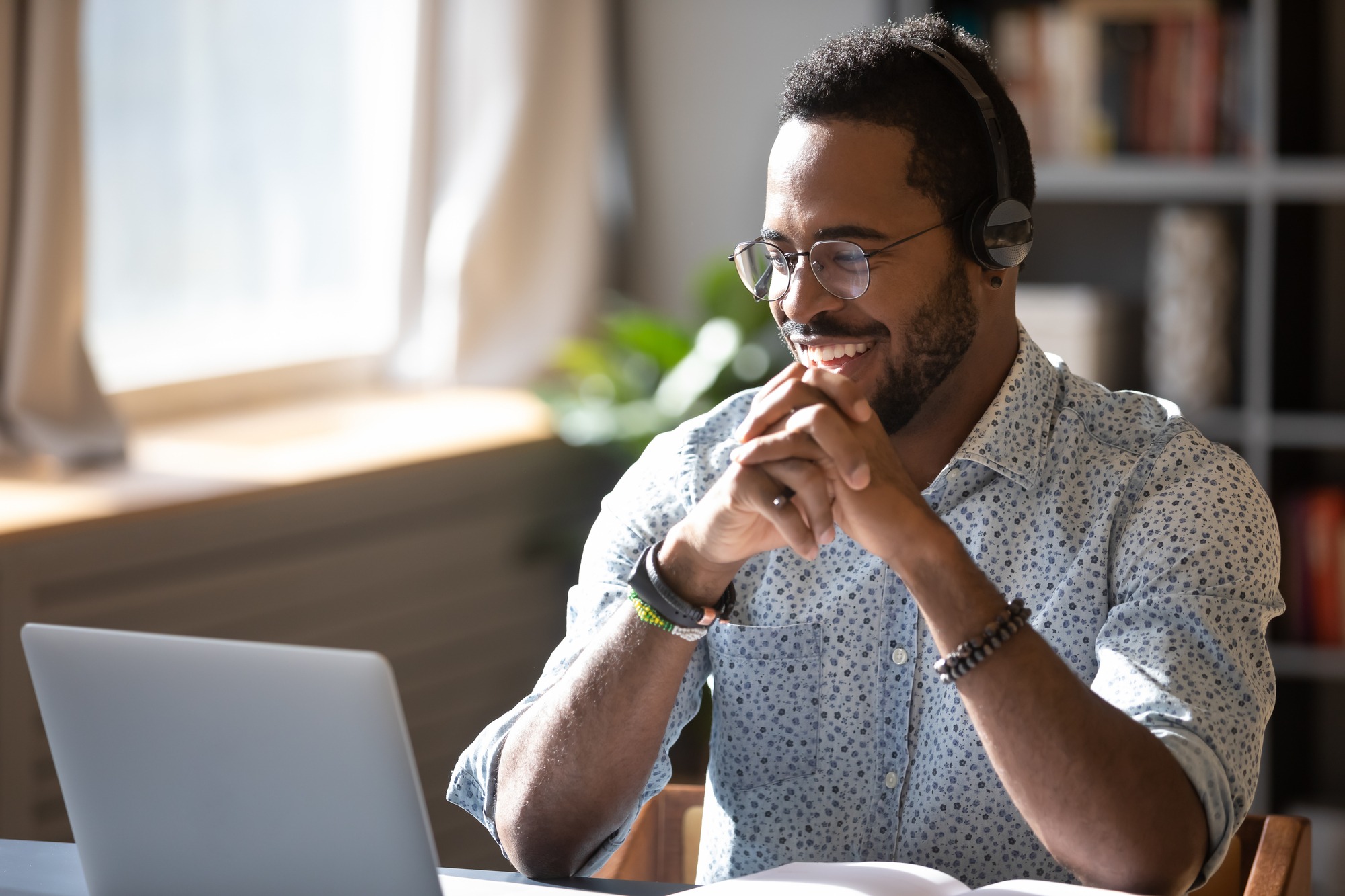 Man in glasses wearing headphones